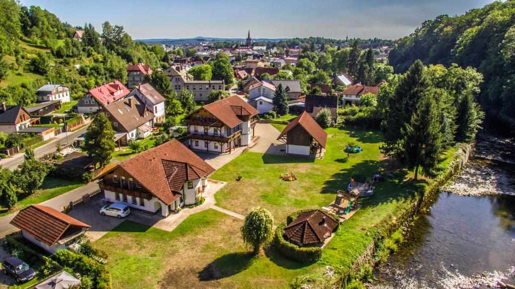 Pension 222 - Family rooms in Vrchlabi, aerial view of the guesthouse, garden and the River Elbe